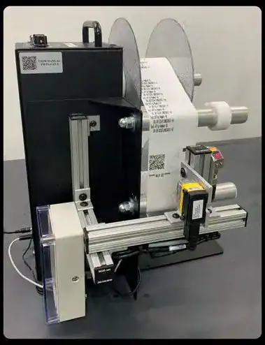 TwinCat label rewinder with a Cognex DataMan reader and paper roll