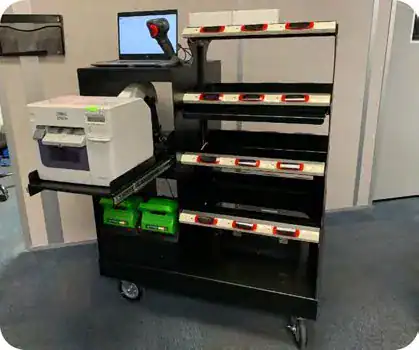 Custom mobile pick-to-light cart with waterfall shelves, Epson color printer, and laptop