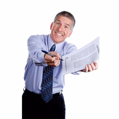 Smiling salesman holding out a pen and contract